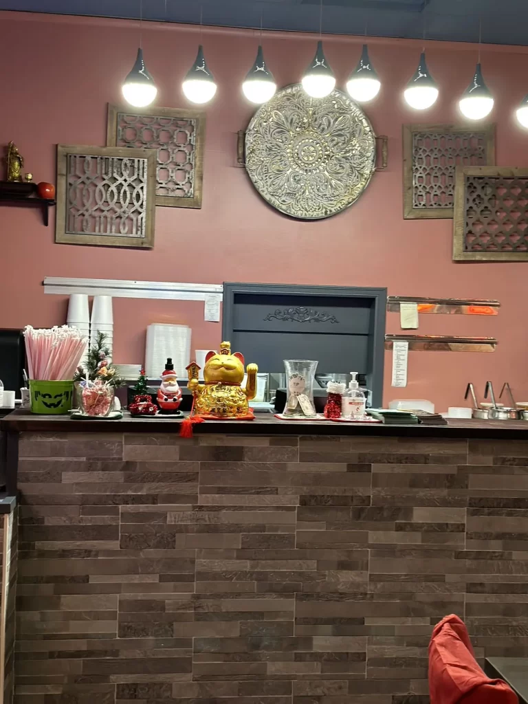 Counter area with wall decor at Peking Garden, a Chinese Restaurant in Sumner